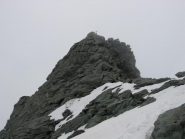 La punta con la croce vista dal ghiacciaio