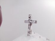 7- la croce di vetta fiorita di neve