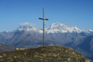 la croce della Punta Pierre con vista su Mont Velan e Grand Combin