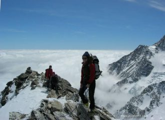 in cima