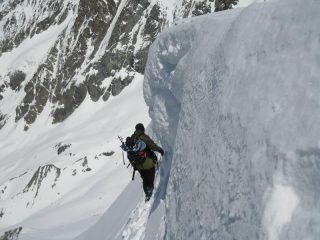 Traverso sotto la cornice