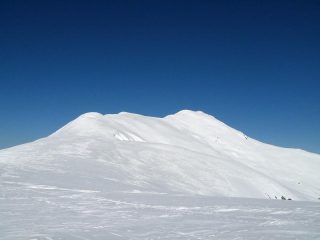 La lontanissima cima con la croce