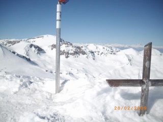 in cima
