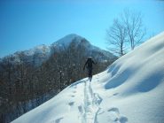 otaner in salita con lo sfondo dell'Uja di Calcante C