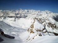 Il magnifico vallone dove si snoda l'itinerario francese da Plampinet per la nostra punta. In primo piano le Rochers de Malapas.