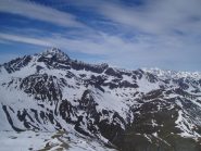 pic de rochebrune e, in lontananza, il delfinato con la barre des ecrins