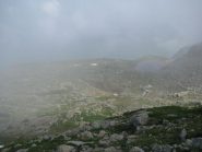 Nella nuvolaglia si intravede il Lago di Quinzeina