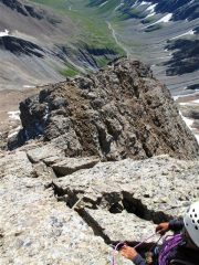 La parte da disarrampicare e sotto il pendio di roccette e sfaciumi da scendere