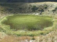 l'antica sede del ghiacciaio è ora occupata da stagni e torbiere di alta quota