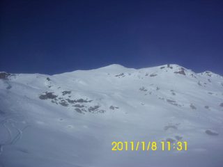 Uscita dalle nebbie, la cima sopra di noi
