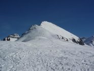 la cima col pendio di discesa visti dal santuario