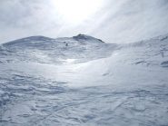 La discesa e il sole che si specchia sulla neve