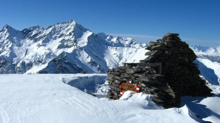 in cima