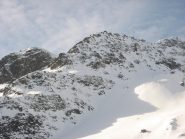 passaggio sopra la barra di roccia per accedere al canalone