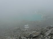 Discesa verso il lago, apertura nella nebbia