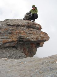 in cima