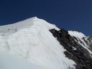 Spalla W con dietro la punta dello Strahlhorn