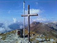 in cima