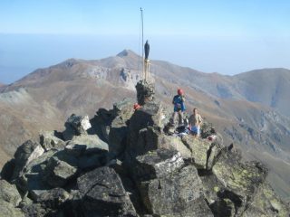in cima