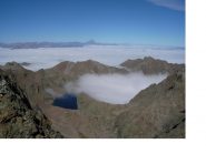 Il Lago soprano del Sella e all'orizzonte il Monviso dalla Rocca di Valmiana