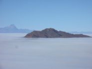 Costa Rossa nel mare di nebbia