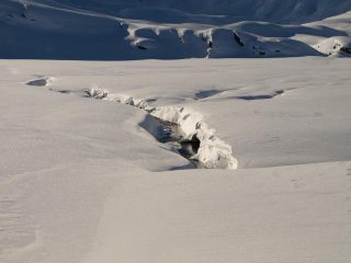 Un ruscello che alimenta il Lago Miserin