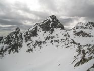 CORBORANT SOTTO UN CIELO PLUMBEO