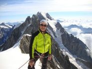 in cima  con la cresta ovest del grande jourasses alle spalle