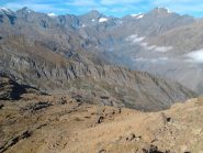 vista dal colle del Monte Rosso (2590). in basso il lago Casias, sullo sfondo Bessanese e Ciamarella