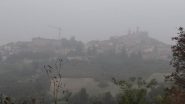 Vignale nella foschia mattutina