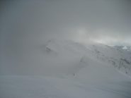 dalla sommità vista sul Monte Zerbion e col Portola geografico, dove arriva il sentiero estivo da Barmasc
