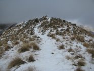 Arrivo in vetta in contemporanea alla nebbia