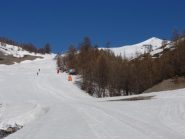 Dalla pista vallon s'intravede la cima