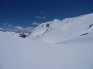 sul versante francese, salita verso l'antecima NNW q.2696, Pebrun a sx