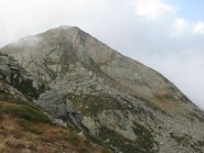 Cima Las Rubbia, a dx la cengia erbosa di discesa fra le placche