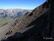 L'esposto e ripido traverso su sfasciumi verso la Rocca Reis