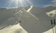 in cima