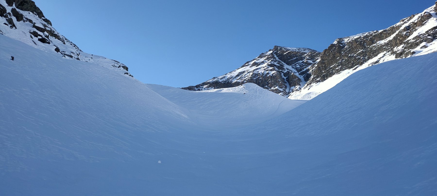 Salita per i canaloni, il Monte Palon sulla desta
