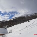 case di Les Balmettes sotto il colle