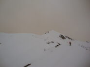 In salita con al fondo il Ciamusse