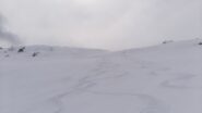 Curve nella neve fresca di maggio