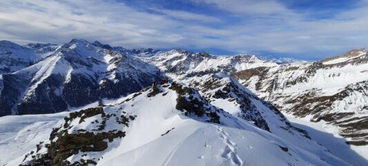 in cima