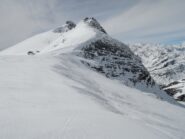 Breithornpass con affiioramenti di ghiaccio e cornice ridottissima