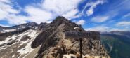 Cima con dietro punta Muta e Gran Roc