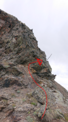 Bastone che indica il passaggio sulla salita al Rosso 