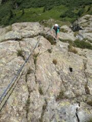 in uscita da un passo atletico, nella parte superiore della via