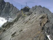 risalita del dente di vetta; 1-roccia obliqua oltre la quale si vede la vetta altrimenti non visibile:2