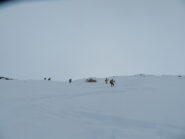 discesa nel vallone di Sort lungo l'iniziale ripido pendio sottostante la croce