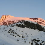 arriva il sole sulla Punta Rossa