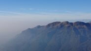Monviso in lontananza, foschia in basso